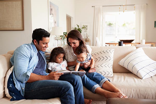 family spending time on couch