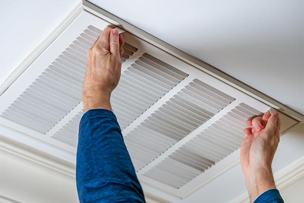 Opening ceiling vent to clean